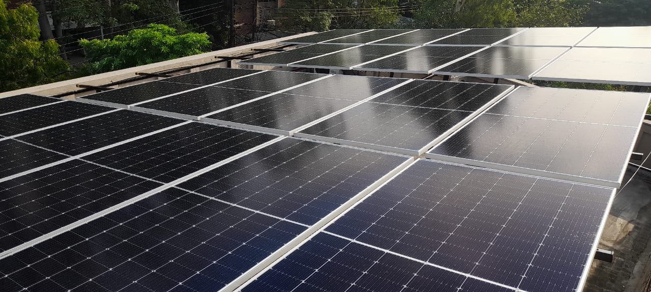 Sunlight falling across installed solar panels